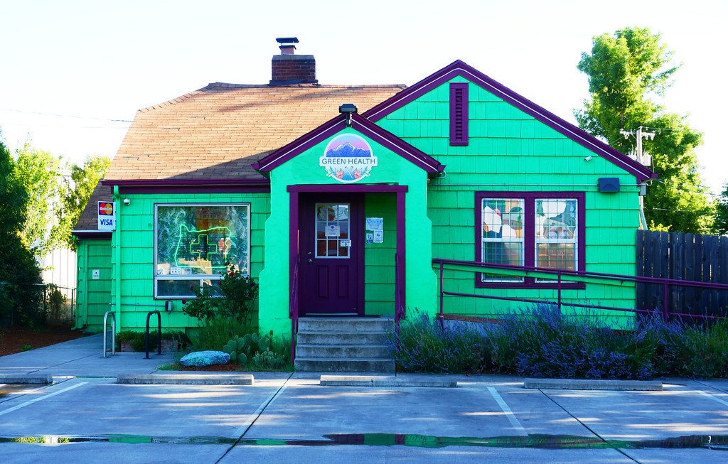 Cannabis shop in a bright green converted house